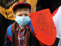 A child takes part in a rally of solidarity with Belarusian protests on Independence Square in Kyiv, Ukraine on 25 October 2020. Belarusians...