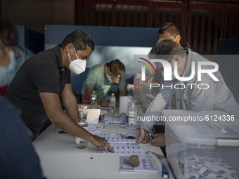 Chilean people at the polling station  during the national referendum, on October 25, 2020 in Santiago, Chile. (