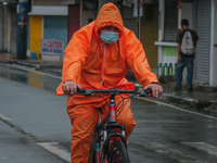 Bikers in Antipolo City start a day ride today with rain coat while riding a bike this morning of October 26, 2020. As of 3:30 AM of October...
