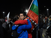 People celebrate the approval of a new constitution in Plaza Italia, an iconic place for protests and celebrations in Santiago, Chile on Oct...