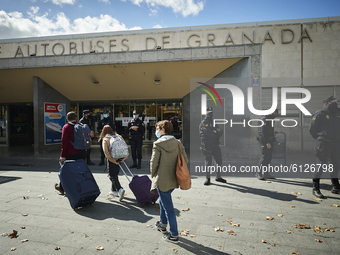A group of police officers guard the entrance of the Granada Bus Station on October 26, 2020 in Granada, Spain. Granada and its metropolitan...