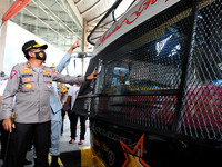 Police Review the readiness of travelers and bus readiness at the Pulo Gebang bus terminal, Cakung, Jakarta on October, 26, 2020. Travelers...