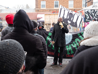 CAIR-MN executive director Jaylani Hussein speaks out against systemic racism, mass incarceration, and exploitative capitalism during a rall...