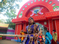 A girl is standing infront of Durga Puja Pandel at Sherpur, Bogura in Bangladesh on 26 October 2020 Hindus in Bangladesh are celebrating Vij...
