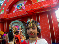 A girl is standing in front of Puja Pandel at Sherpur, Bogura in Bangladesh on 26 October 2020 Hindus in Bangladesh are celebrating Vijayada...