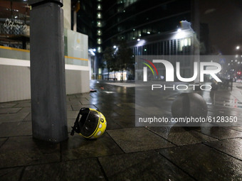 Helmets are seen on the ground during anti-government demonstrations on October 26, 2020 in Milan, Italy. Following a surge in new COVID-19...