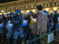 Demonstrators clash with Riot Police during the protest against the lockdown in Piazza Castello on October 26, 2020 in Turin, Italy. The pro...