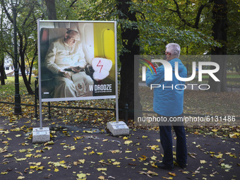 An outdoor exhibition about Pope John Paul II was marked with a symbol of Women's Strike on a day of another protest against restrictions on...