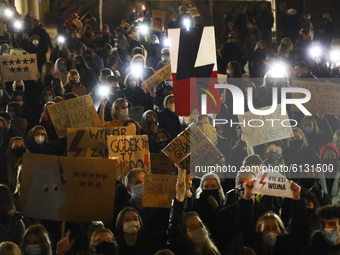 People demonstre at the Main Square during another day of the protests against restrictions on abortion law in Poland.Krakow, Poland on Octo...