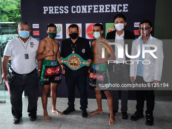 Wanchana Meenayothin of Thailand former WBC Inter Continental Youth Champion, Omar Elquers of Morocco and promotors poses for photo during t...