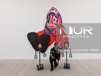  Pop artist Philip Colbert accompanied by robots enlisted to allow digital users to explore the exhibition via their smartphone or computer...