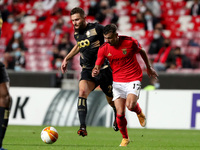 Nicolas Gavory of Standard Liege (L) vies with Diogo Goncalves of SL Benfica during the UEFA Europa League Group D football match between SL...