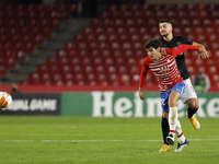 Jesus Vallejo, of Granada CF and Antonio Colak, of PAOK FC during the UEFA Europa League Group E stage match between Granada CF and PAOK FC...
