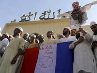 Supporters and activists of the Islami Oikya Jote, an islamist political party, take part in a protest calling for the boycott of French pro...