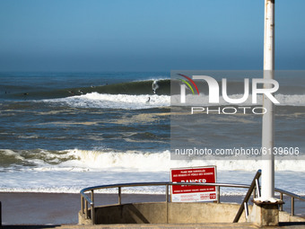 Around 30 surfers confronted the big waves in Hossegor, France, on October 30, 2020 despite the water sports on the beach are prohibited, si...