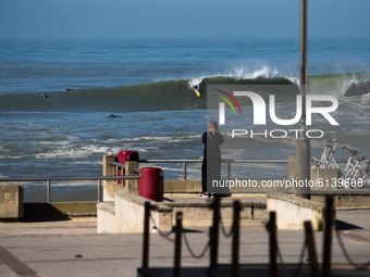 Around 30 surfers confronted the big waves in Hossegor, France, on October 30, 2020 despite the water sports on the beach are prohibited, si...