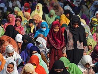 Kashmiri muslim women pray on the occasion of celebration of Mawlid-un-Nabi or Prophet Muhammad's (PBUH) birth anniversary in Dargah Hazratb...