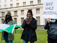 A group of people gather to protest against brutality of Nigerian Special Anti-Robbery Squad (SARS) in London, Britain, 31 October 2020. UN...