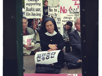This Pictures taken date is 2003. A Elderly nun participant anti-war rally about South Korean government Iraq military dispatch policy at ne...