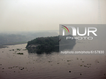 A view of Yamuna river amid a layer of smoky haze, as the air quality of the national capital hit 'very poor' levels due to stubble burning...