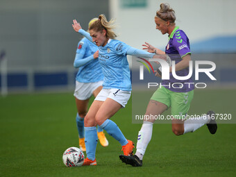  Citys Laura Coombs battles with Brightons Jasmine Mathews  during the Barclays FA Women's Super League match between Manchester City and Br...