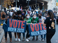 Philadelphians gather in front of the Pennsylvania Convention Center to celebrate Vice President Biden being declared winner of the 2020 pre...