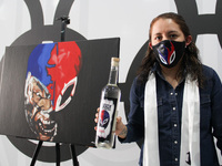 Artist Iliana So during a press conference promotes 'Mezcal del Luchador' as part of Expo Masks to support the Mexican wrestlers in time of...