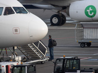 Passengers seen boarding in aircraft at Eindhoven Airport EIN EHEH in the Netherlands during the Coronavirus Covid-19 pandemic era. Each pas...
