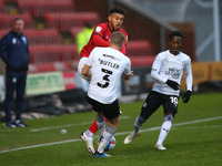  Crewes Daniel Powell charges forward and clatters into Boro’s Dan butler  during the Sky Bet League 1 match between Crewe Alexandra and Pet...