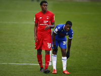 L-R Tunji Akinola of Leyton Orient and Colchester Uniteds Michael Folivi during League Two between Colchester United and Leyton Orient at Co...