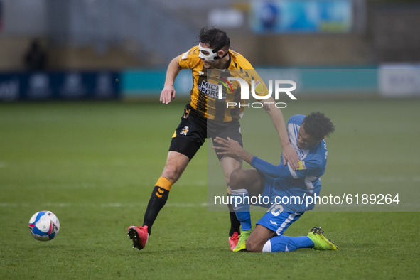  Lewis Hardcastle of Barrow and Michael Rose of Coventry City  during the Sky Bet League 2 match between Cambridge United and Barrow at the...