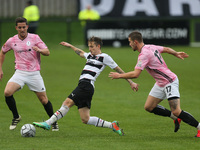 Darlington's Jarrett Rivers in action with Andy Bond and Zak Lilly of AFC Telford  during the Vanarama National League North match between D...