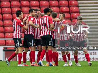  Max Power celebrates with his team mates after scoring his sides first goal of the match during the Sky Bet League 1 match between Sunderla...