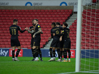  Scott Fraser celebrates with team mates after scoring MK Dons penalty  during the Sky Bet League 1 match between Sunderland and MK Dons at...