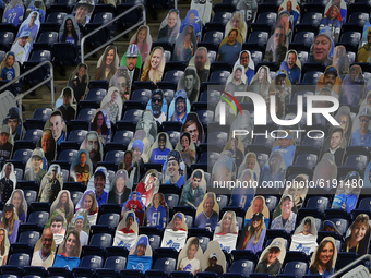 Cutout photos of veterans are placed in the spectator seating area near the endzone during the first half of an NFL football game between th...