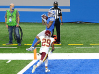 Detroit Lions wide receiver Marvin Jones (11) catches a pass for a touchdown during the first half of an NFL football game against the Washi...