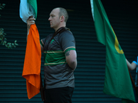 Men holding Irish flags outside Croke Park in Dublin, during a commemoration event to mark the centenary of Bloody Sunday, organised by 'The...