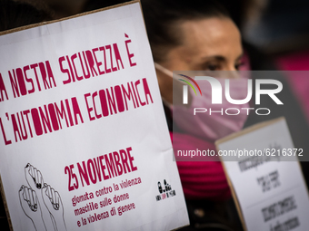 Activists of the Italian feminist movement 'Non Una Di Meno' in a protest against violence against women in Montecitorio square in Rome on N...