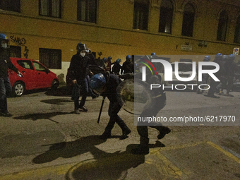 An injured police man during the clash between the protesters and the police at demostration in Roma organized by left movements after the e...