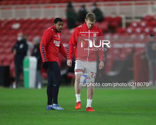 Britt Assombalonga and George Saville of Middlesbrough during the Sky Bet Championship match between Middlesbrough and Derby County at the R...