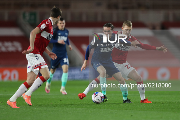 Max Bird of Derby County in action with Middlesbrough's George Saville  during the Sky Bet Championship match between Middlesbrough and Derb...