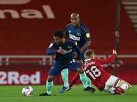 Nathan Byrne of Derby County battles with Middlesbrough's Duncan Whatmore during the Sky Bet Championship match between Middlesbrough and De...