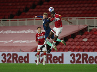 Kamil Jozwiakk of Derby County contests a header with Middlesbrough's Anfernee Dijksteel during the Sky Bet Championship match between Middl...