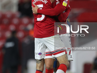 Marvin Johnson of Middlesbrough celebrates with Marcus Tavernier after scoring their third goal during the Sky Bet Championship match betwee...