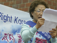 A Conservative group members rally during an Opposition of Ex-President Kim Dae Jung visit North Korea at near Kim's house in Seoul, South K...