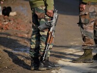  Indian army soldiers conduct search operation near the site of attack at HMT area of Srinagar,Kashmir on November 26,2020.Inspector General...