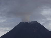 Solfatara smoke spews from the top of Merapi volcano as seen from Yogyakarta, on November 26, 2020. The activitiy of Merapi volcano is conti...