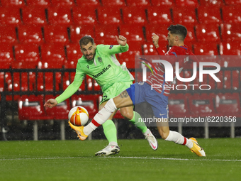  Charis Mavrias, of AC Omonoia and Carlos Neva, of Granada CF  during the UEFA Europa League Group E stage match between Granada CF and AC O...