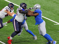 Detroit Lions defensive end Nick Williams (97) holds the line against Houston Texans offensive guard Zach Fulton (73) during the first half...