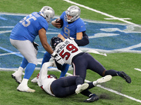 Detroit Lions quarterback Matthew Stafford (9) is tackled by Houston Texans outside linebacker Whitney Mercilus (59) during the first half o...